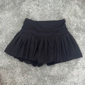 Black gold hinge ruffle skirt